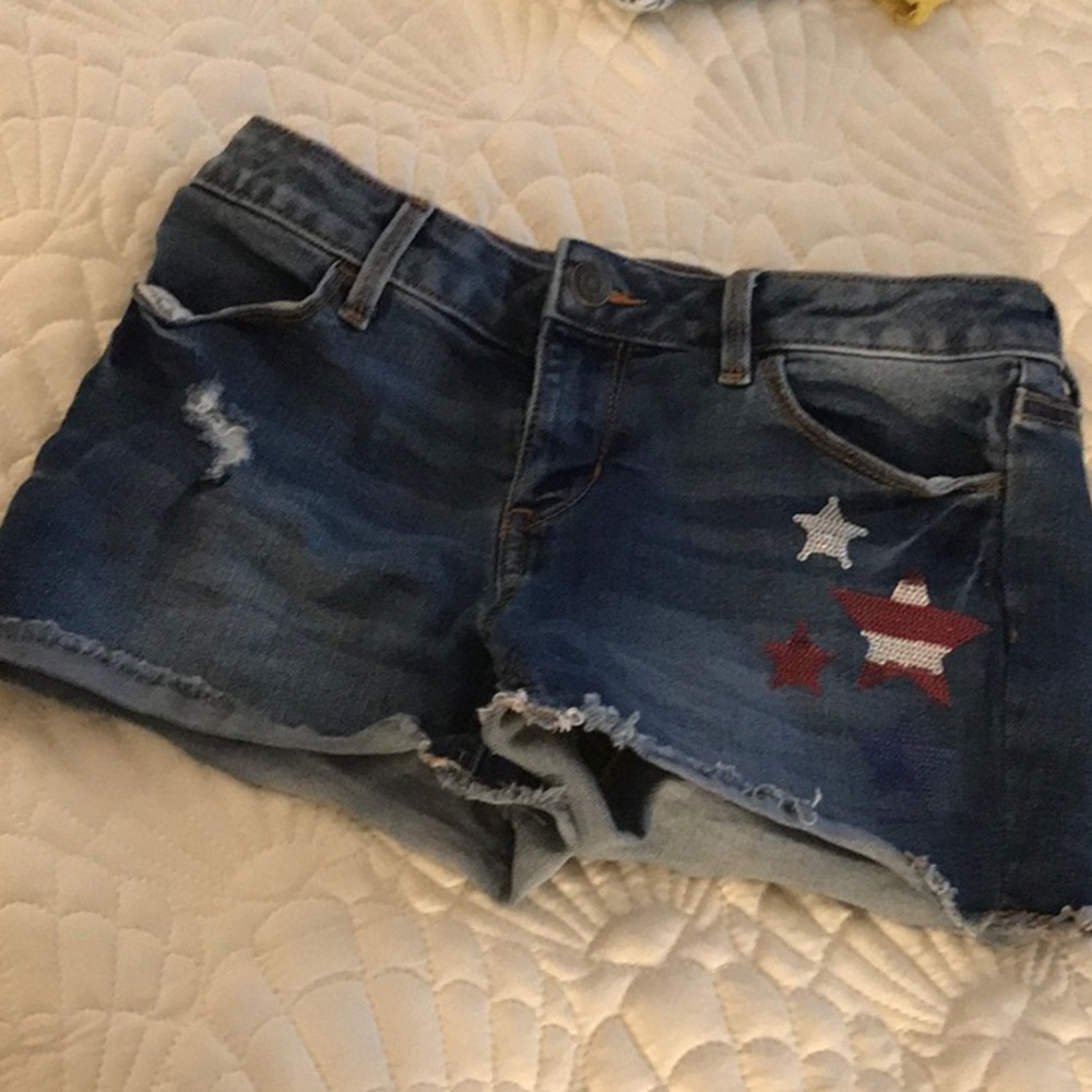 SO Jean girls shorts. Embellished stars. 4 pockets. Size 12